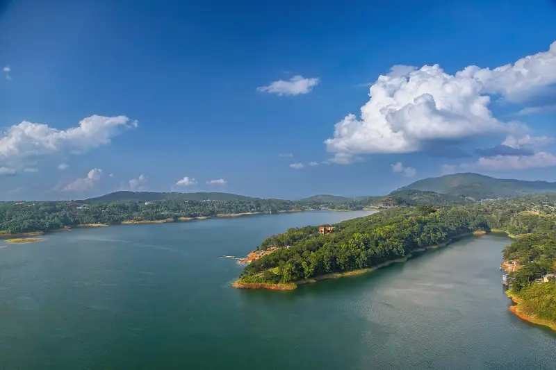 Umiam Lake surrounded by green hills near Shillong, Meghalaya