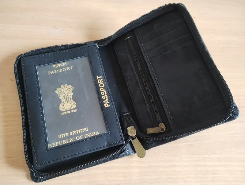 Indian passport in a travel wallet